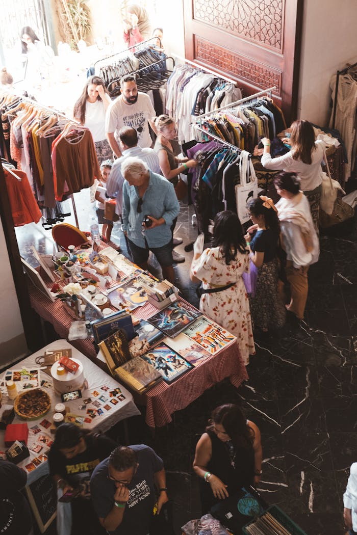 Vibrant indoor market in Rabat, Morocco, displaying diverse items and bustling with activity.